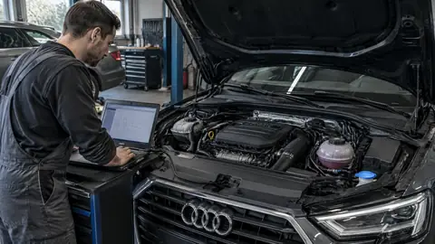 1.5 TFSI-Benzinmotor im Motorraum eines Audi